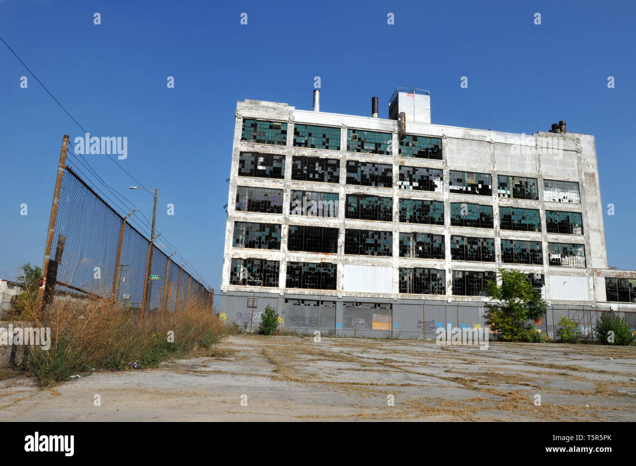 The long-abandoned Fisher Body Plant 21 in Detroit, Michigan. Designed by architect Albert Kahn, the automotive body plant was built in 1919. Stock Photo