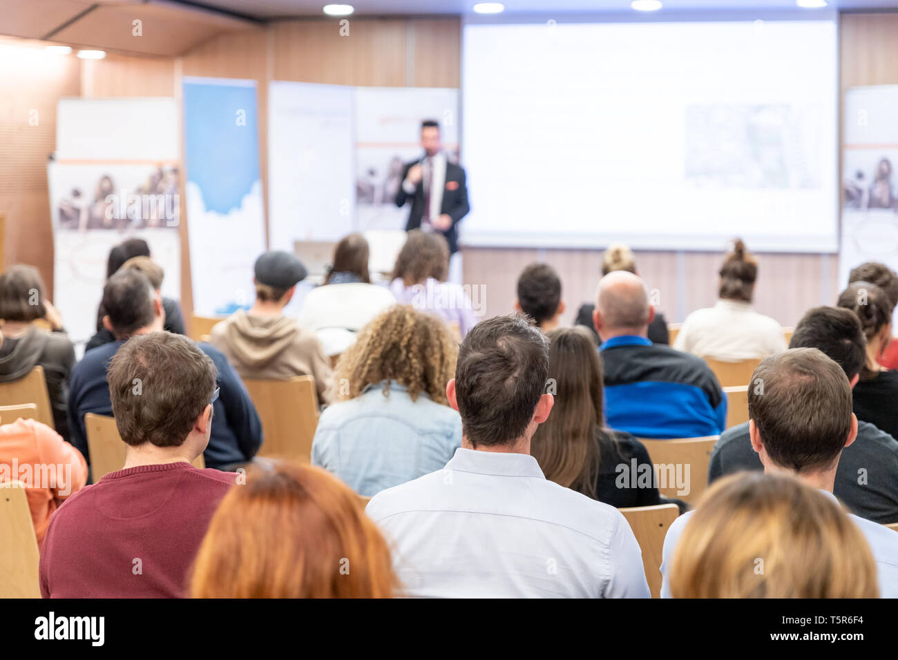 Business speaker giving a talk at business conference event. Stock Photo