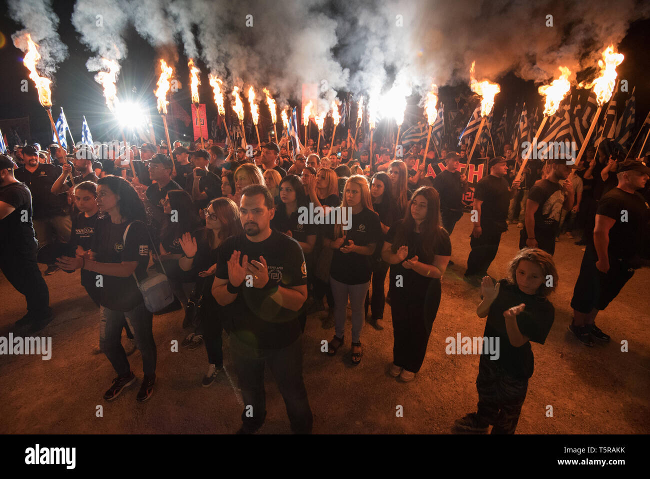 Thermopylae, Greece. 3rd Sep 2016. Golden Dawn supporters hold lighted torches  in front of King Leonidas monument in a rally to honor the fallen of the battle of Thermopylae in Thermopylae, Greece. Credit: Nicolas Koutsokostas/Alamy Stock Photo. Stock Photo