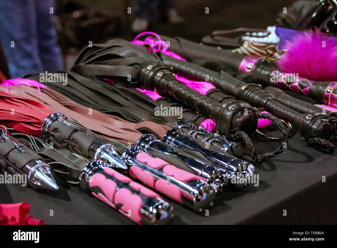 Various sex toys on display on a table Stock Photo - Alamy