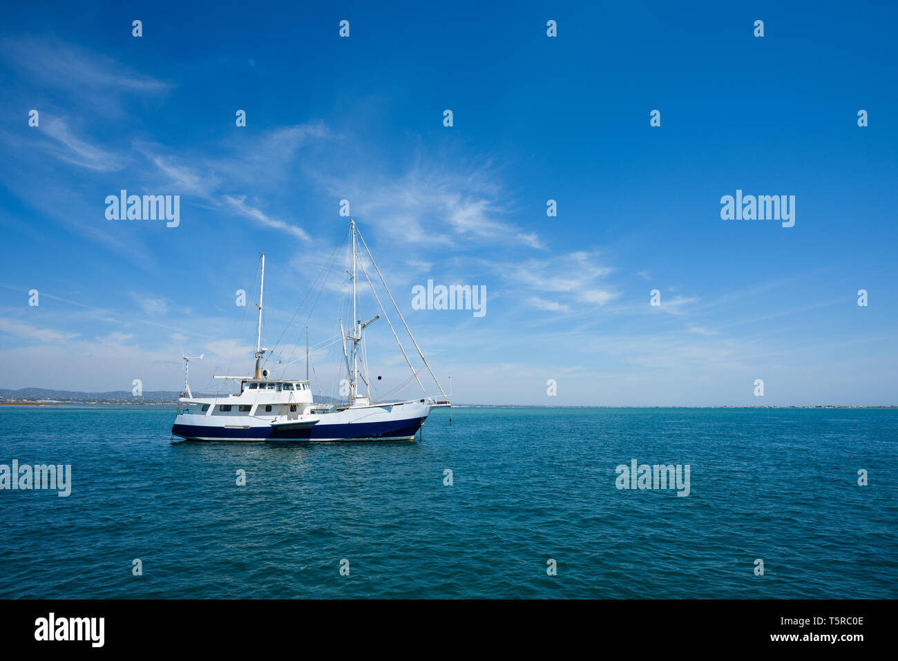 White yacht in the sea at summer day Stock Photo - Alamy