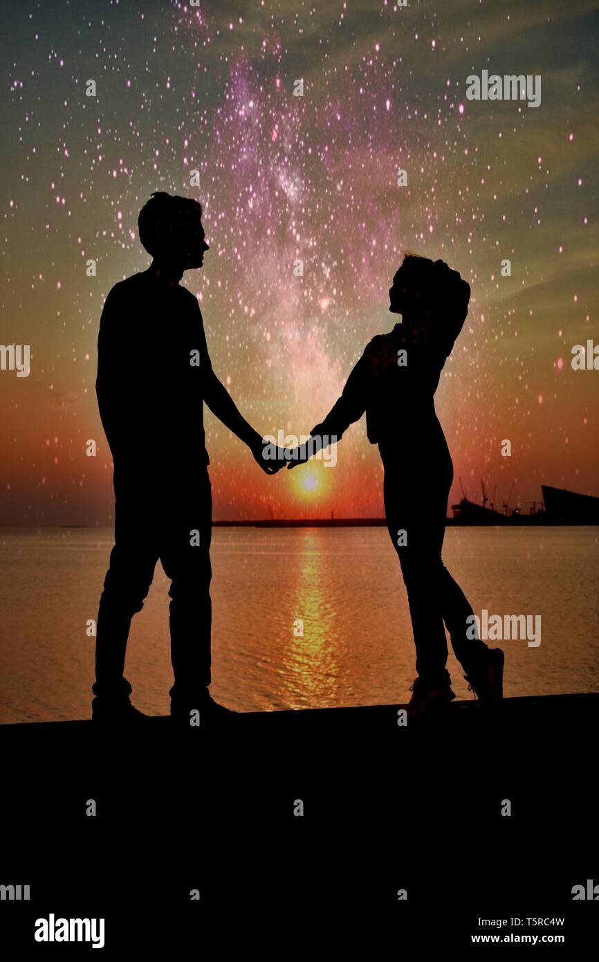 Young Romantic Couple In Love On Colorful Sunset Sea Shore And Beautiful Stars In The Sky Love Concept Stock Photo Alamy Young Romantic Couple In Love On Colorful Sunset Sea Shore And Beautiful Stars In The Sky Love Concept Stock Photo Alamy