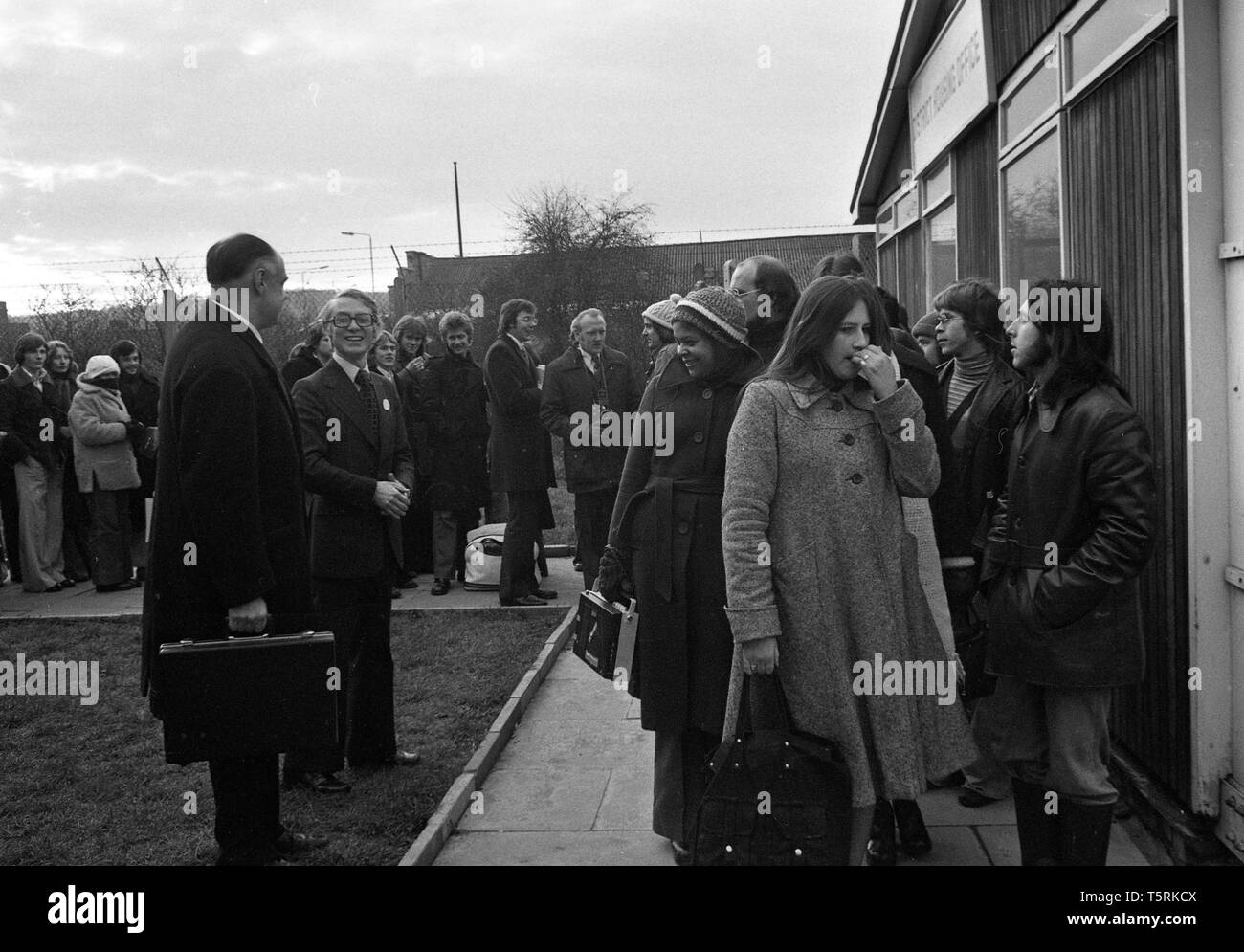 Queues of people outside the Social Housing Office in Harrow Manor Way, Abbey Wood, Greenwich, London in 1976. Stock Photo