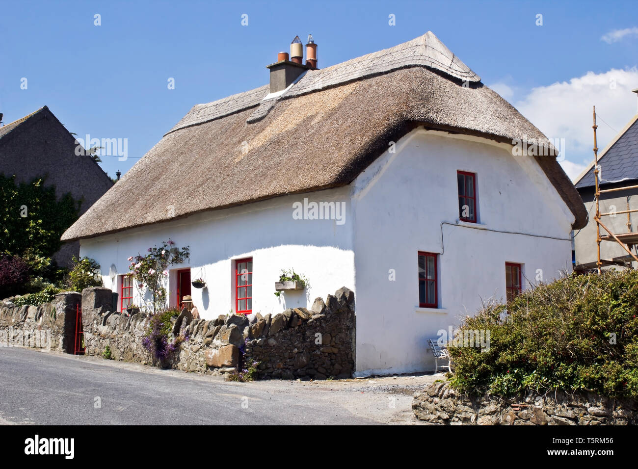 Fine example of an old thatched house in the village of Annestown in