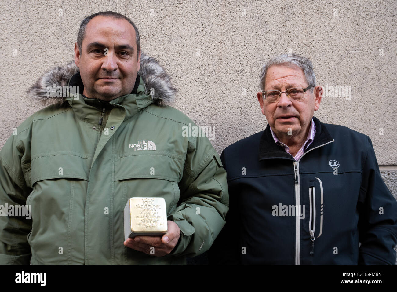 Madrid, Spain. 26th April, 2019. Jorge Diaz (L) and Jose Montañes (R), relatives of Pedro Diaz Clemente holding the Stolperstein in his memory. Stock Photo