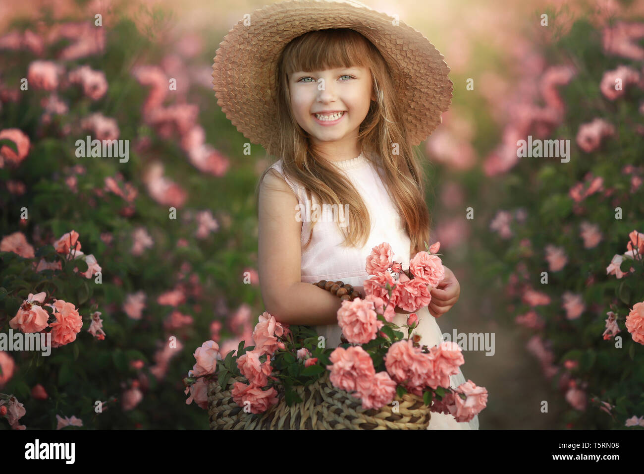 Girl running rose garden hi-res stock photography and images - Alamy