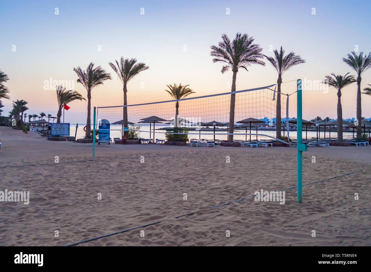 Beach volleyball field on a red sea beach at sunrise in hurghada city Stock Photo