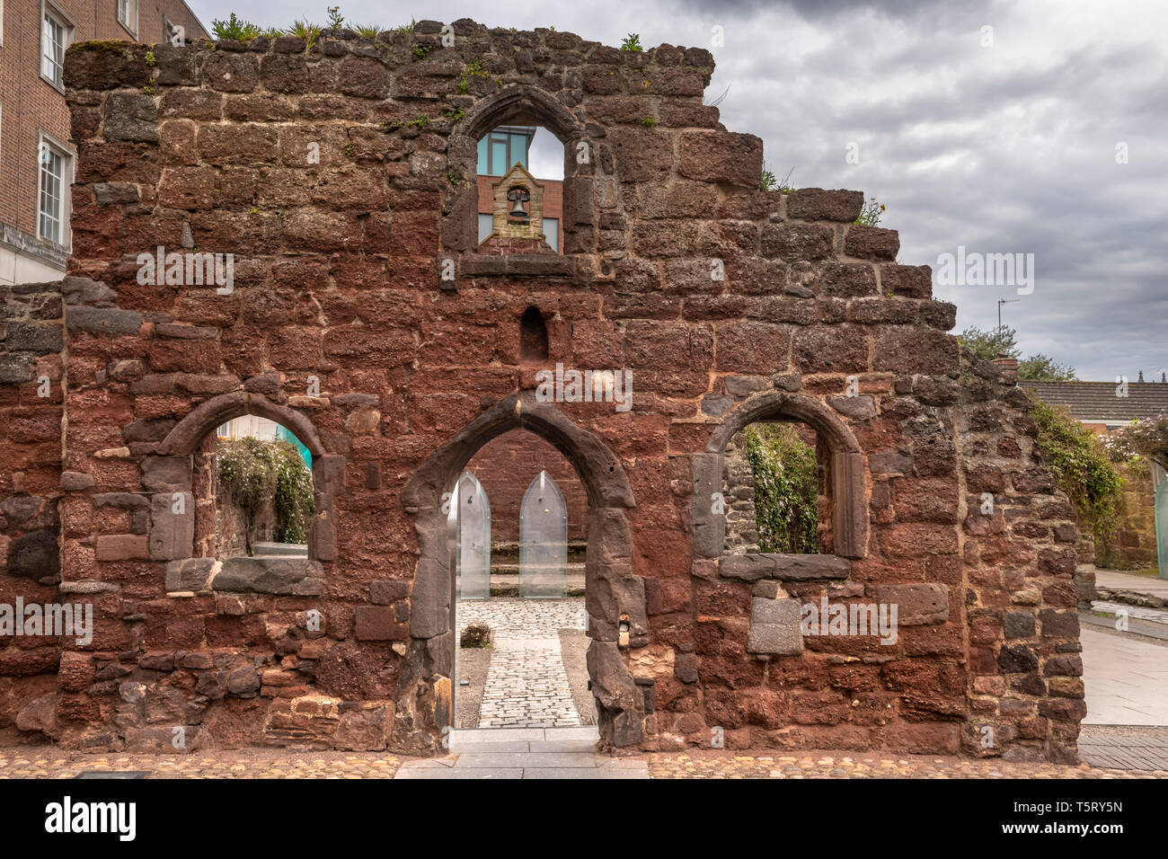 The west wall of the remains of St Catherines's Chapel and Almshouses in the heart of Exeter. This historic site, dating back to the 13th Century, was Stock Photo