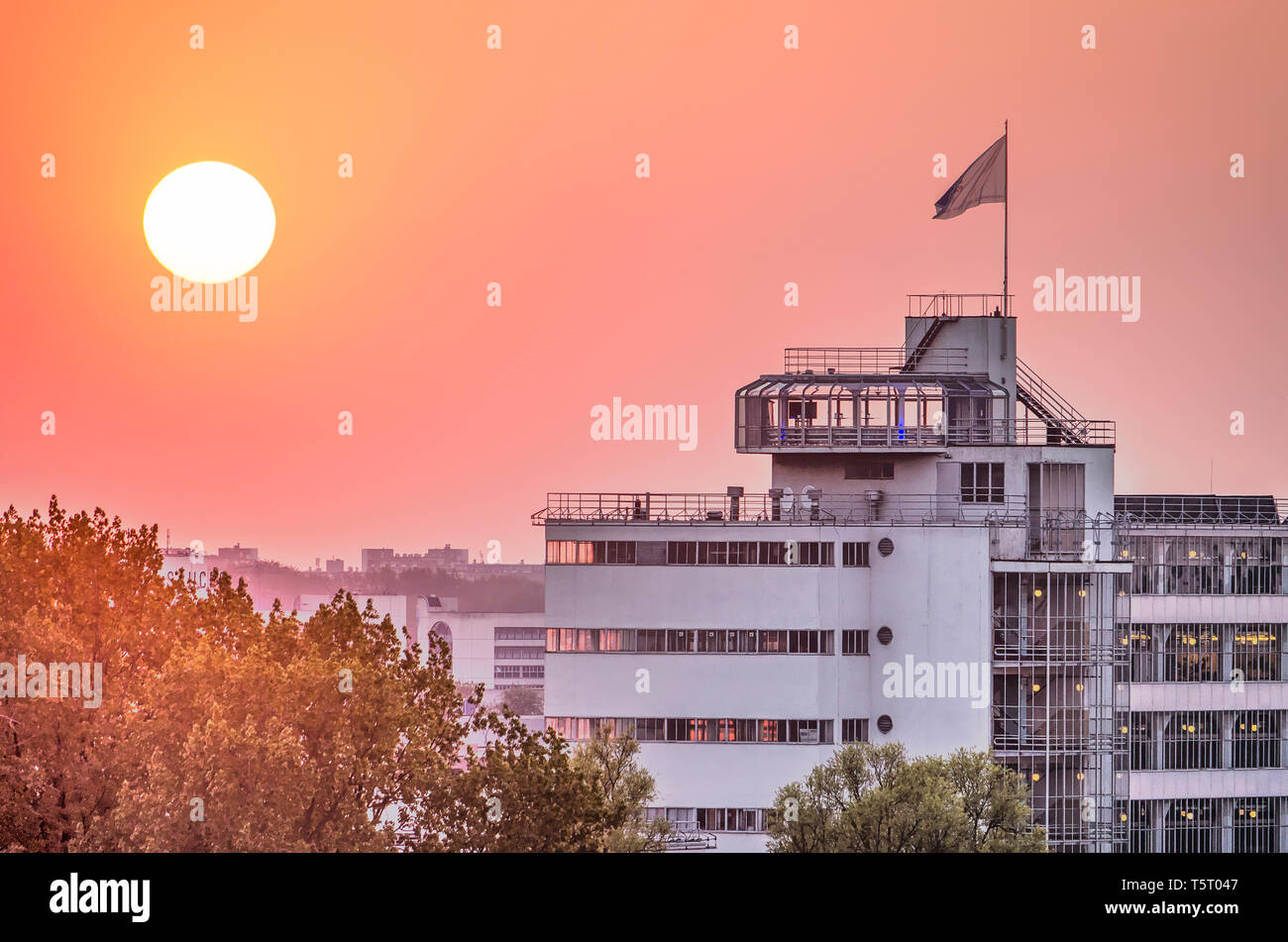 Rotterdam, The Netherlands, April 21, 2019 a fiery sun sets over the