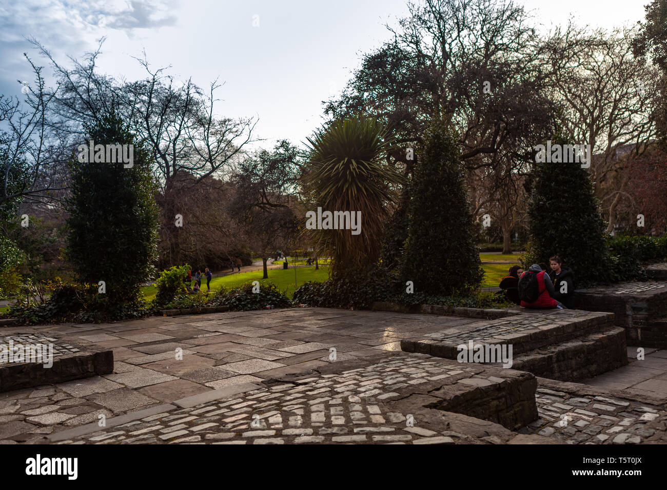 Dublin, Ireland – March 2019. St Stephen's Green City centre park with ornamental lake, waterfall, sculptures and a children's playground. in Dublin Stock Photo