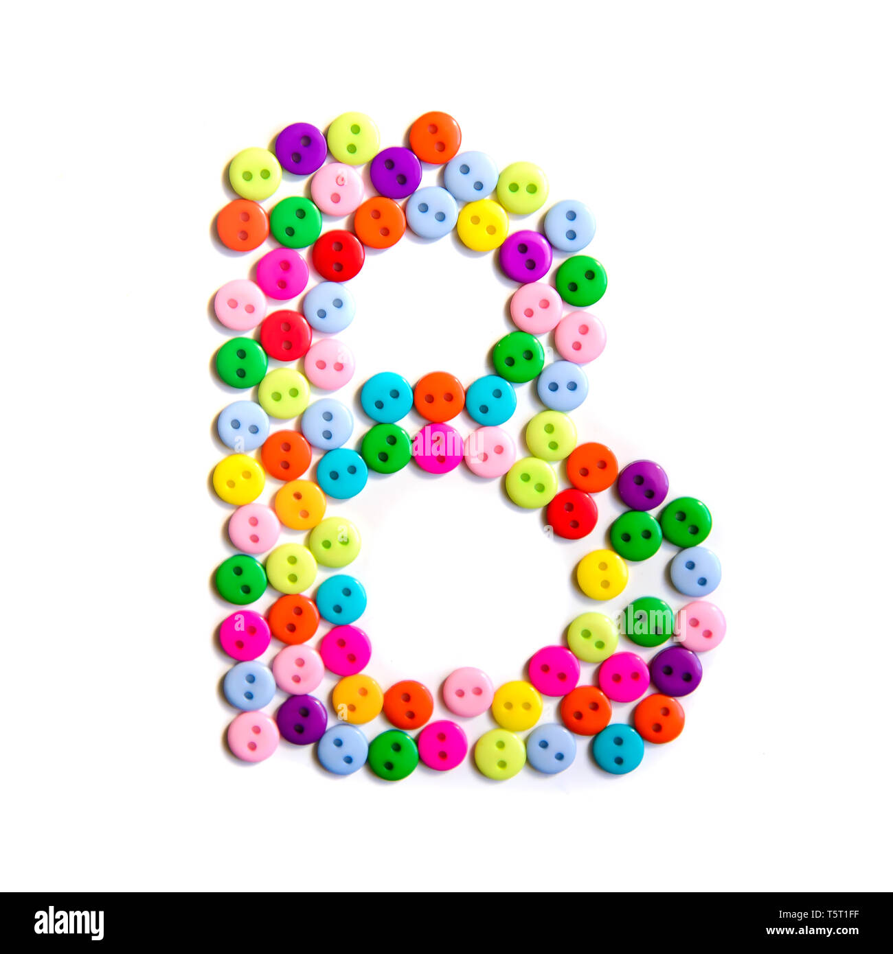 Letter B of the English alphabet from a group of colorful small buttons on a white background Stock Photo