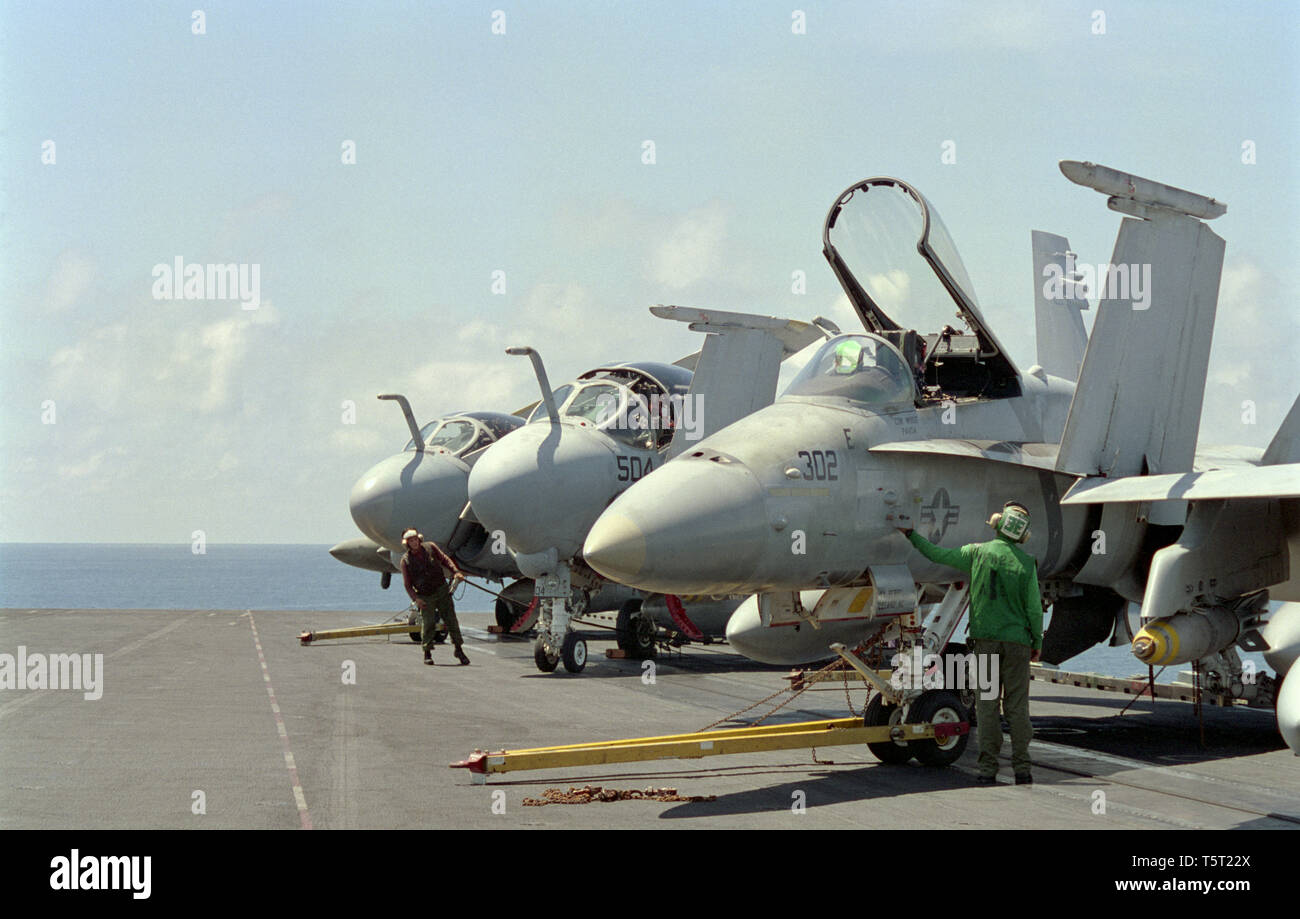 1st November 1993 A-6E Intruders and an F/A-18 Hornet on the flight deck of the USS Abraham Lincoln CVN-72, cruising 50 miles off Mogadishu, Somalia during Operation Continue Hope. Stock Photo