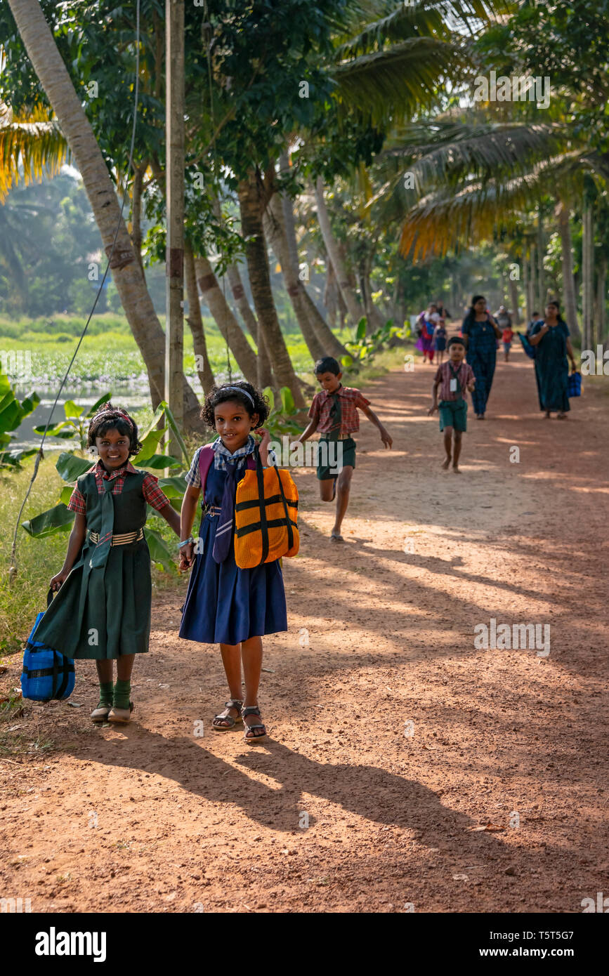 Vertical view of people walking along the riverbank in Alleppy, India Stock Photo