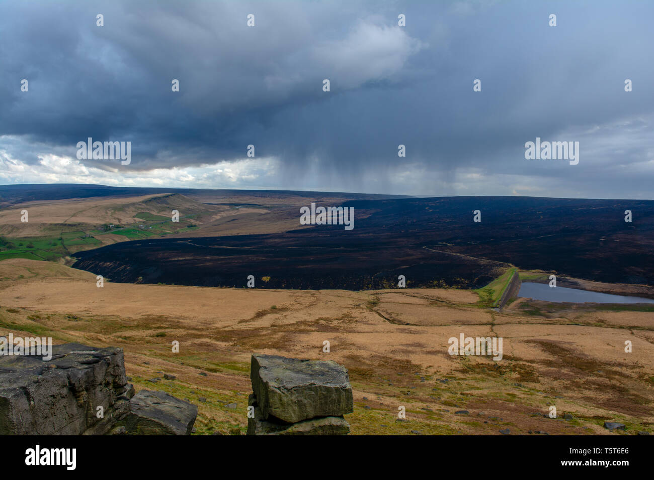 The aftermath of the fires over Marsden moors, with a huge section of the land now black. Stock Photo