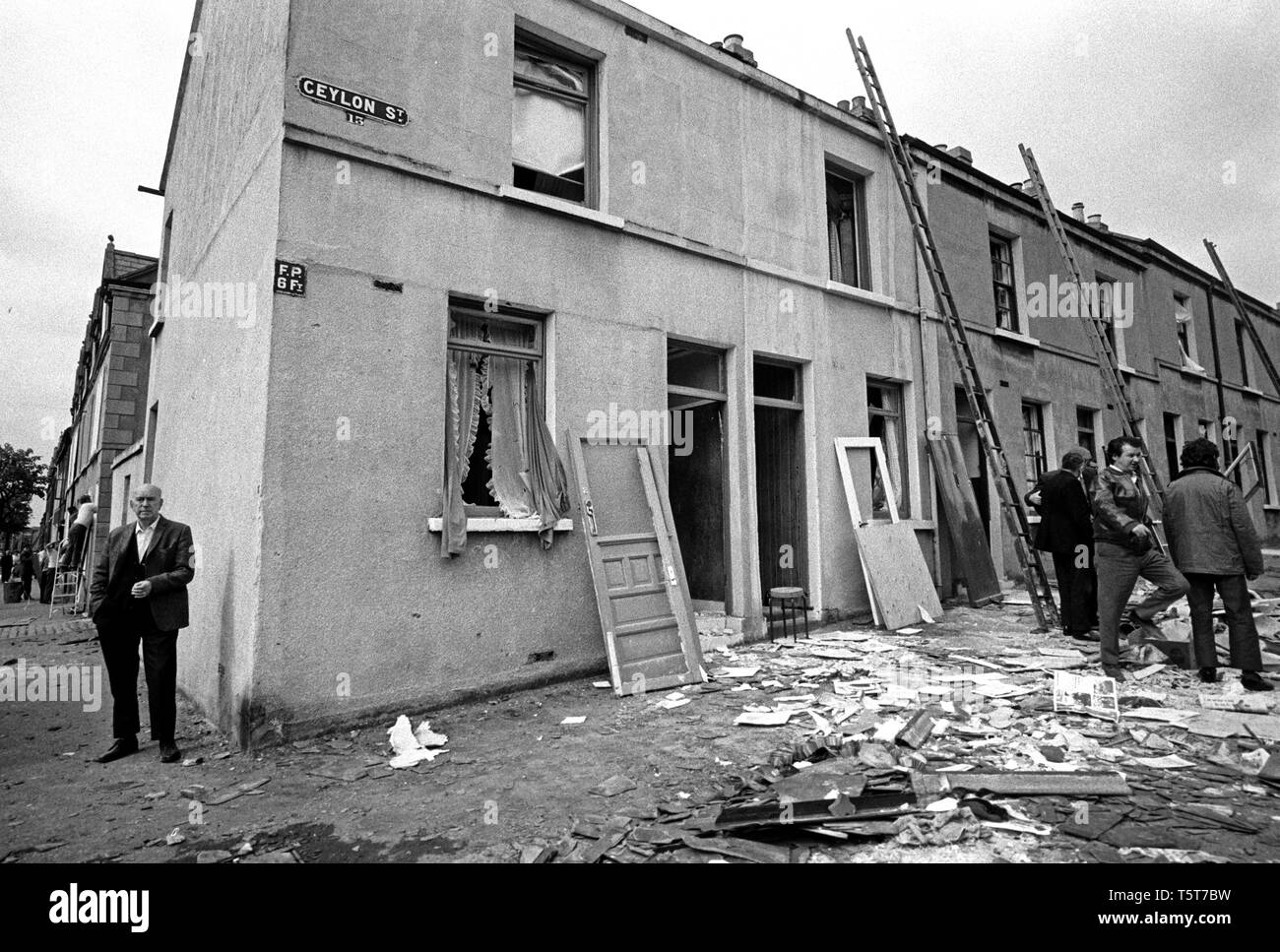 Clearing up after IRA bomb damage in the Shankill Loyalist area of