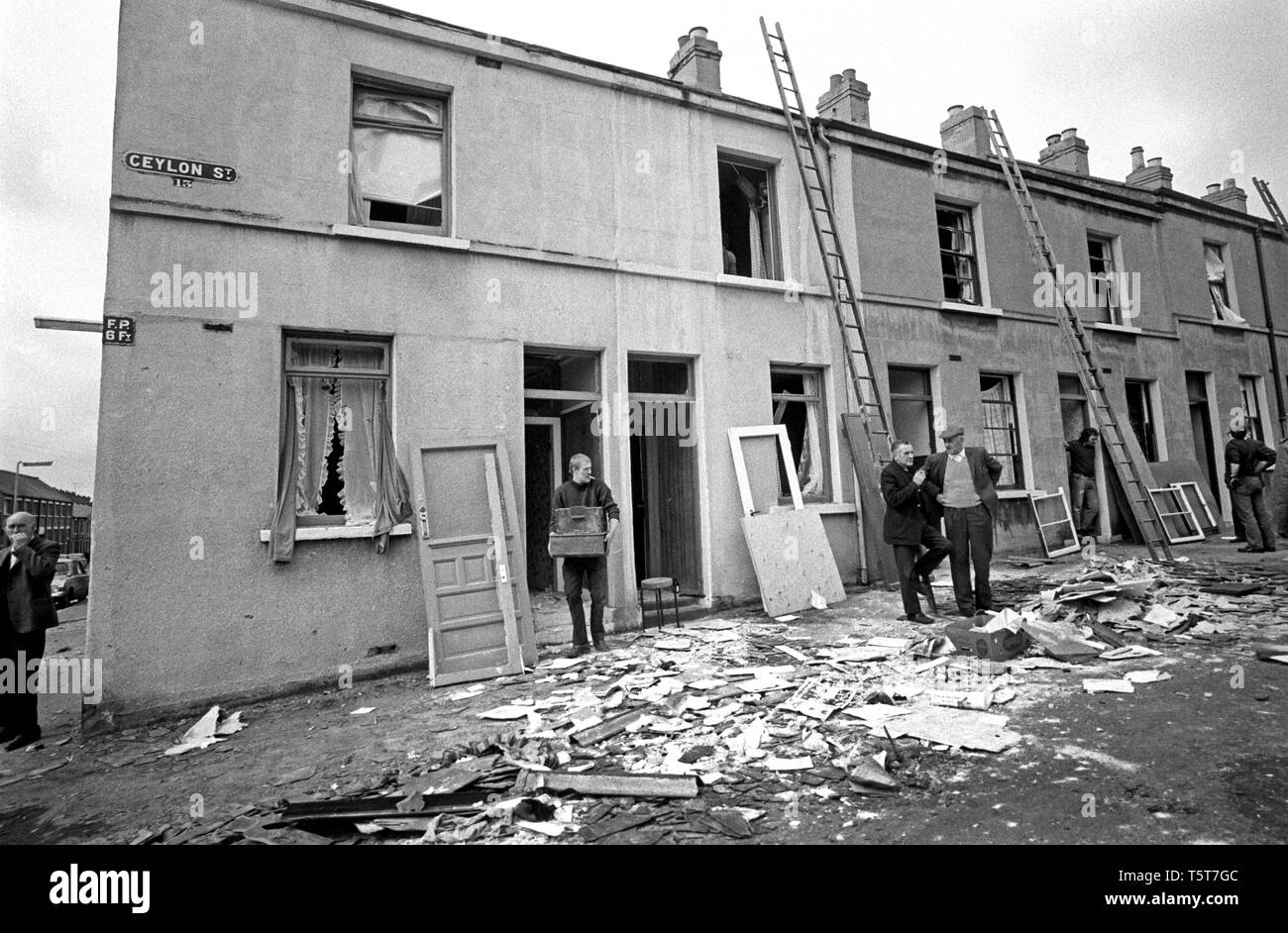 Clearing up after IRA bomb damage in the Shankill Loyalist area of