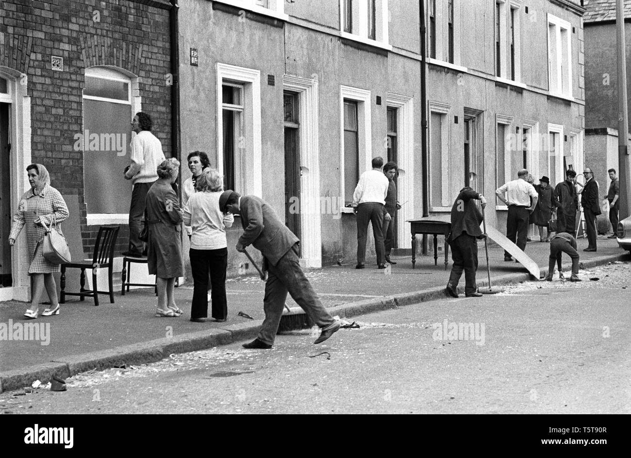 Clearing up after IRA bomb damage in the Shankill Loyalist area of