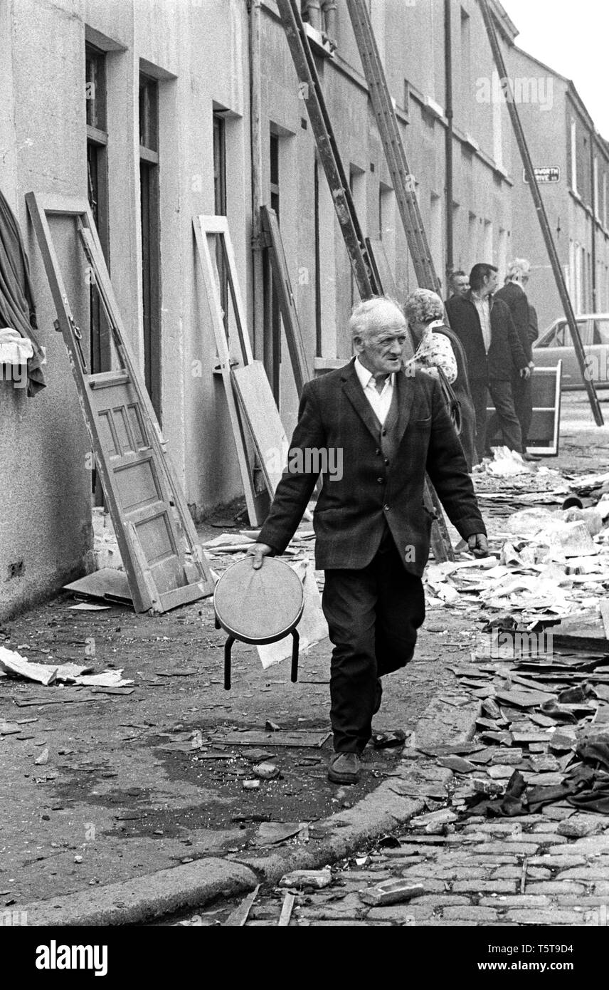 Clearing up after IRA bomb damage in the Shankill Loyalist area of