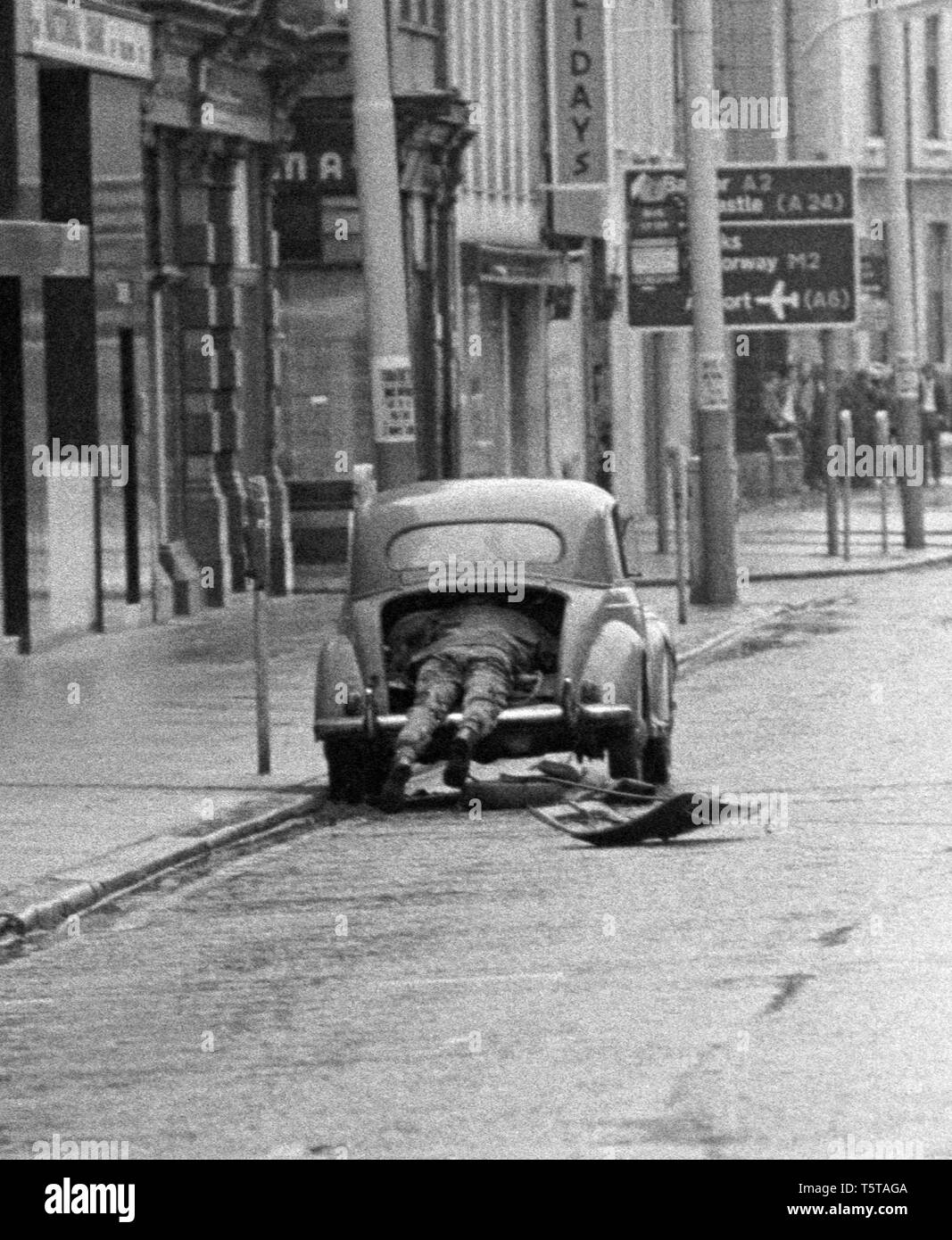 British Army bomb disposal soldier blowing boot of bomb bobby trapped