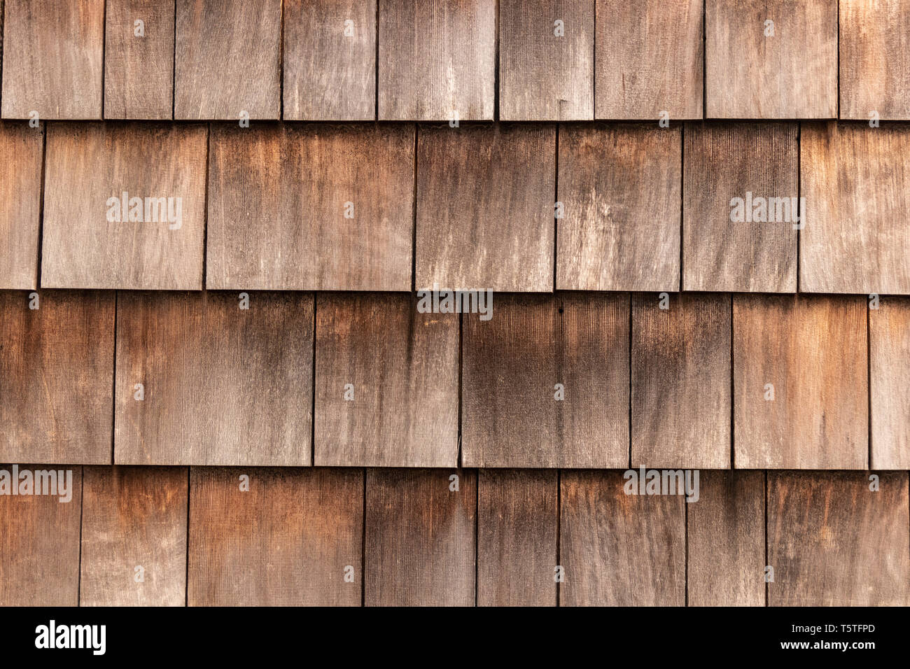 Closeup of weathered wood shingle siding Stock Photo