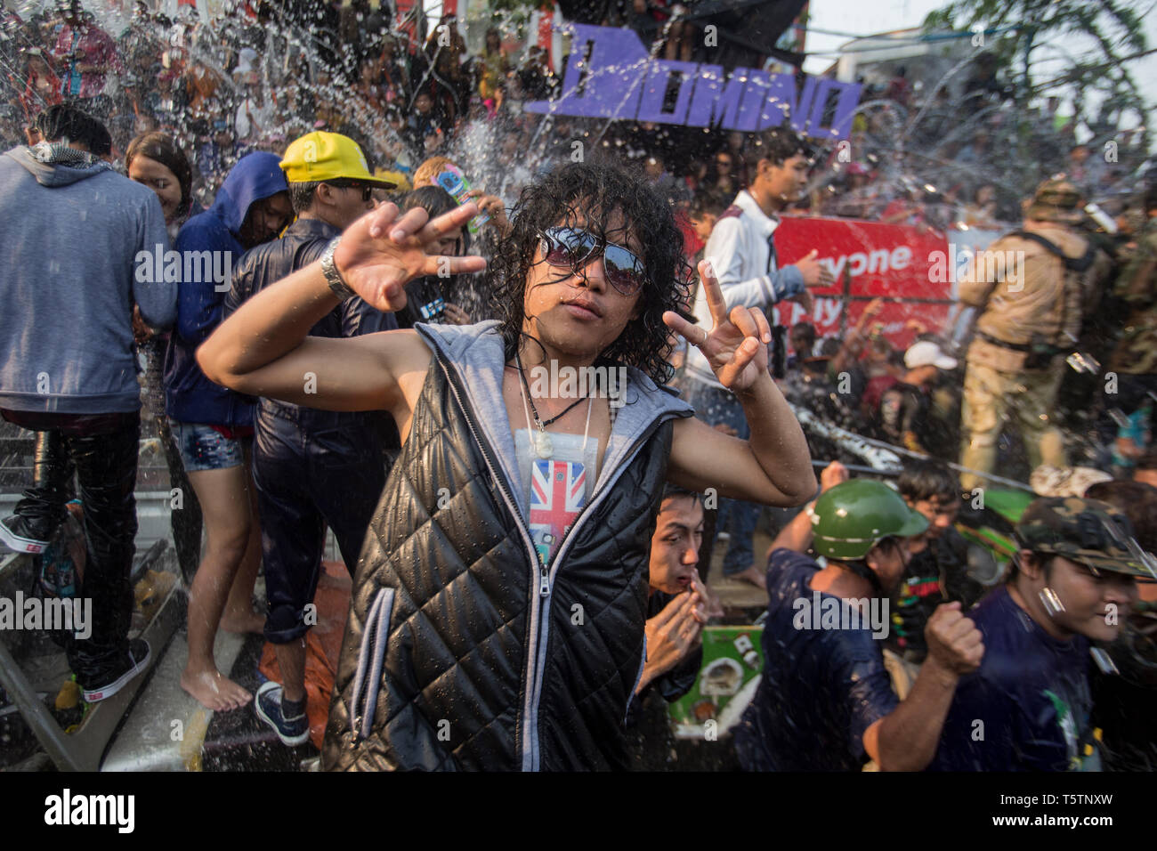 People getting wet and having fun during the Thingyan Burmese New Year Festival in Mandalay, Myanmar. Stock Photo