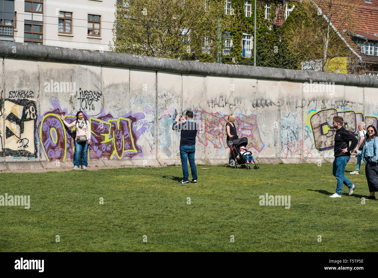 Berlin, Germany April, 2019 People taking pictures at the Berlin Wall Memorial Berlin, Mitte