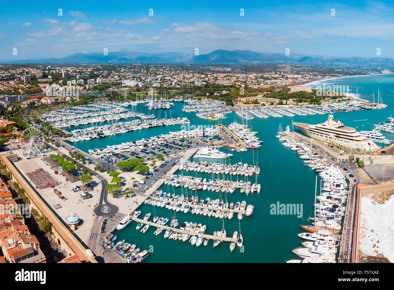 Antibes port aerial panoramic view. Antibes is a city located on the French Riviera or Cote d'Azur in France. Stock Photo