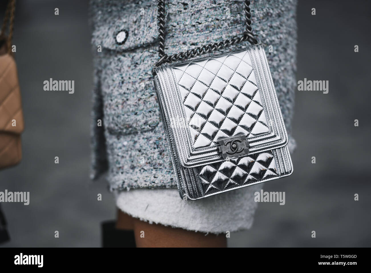 Paris, France - March 05, 2019: Street style outfit - Woman wearing Chanel  purse after a fashion show during Paris Fashion Week - PFWFW19 Stock Photo  - Alamy