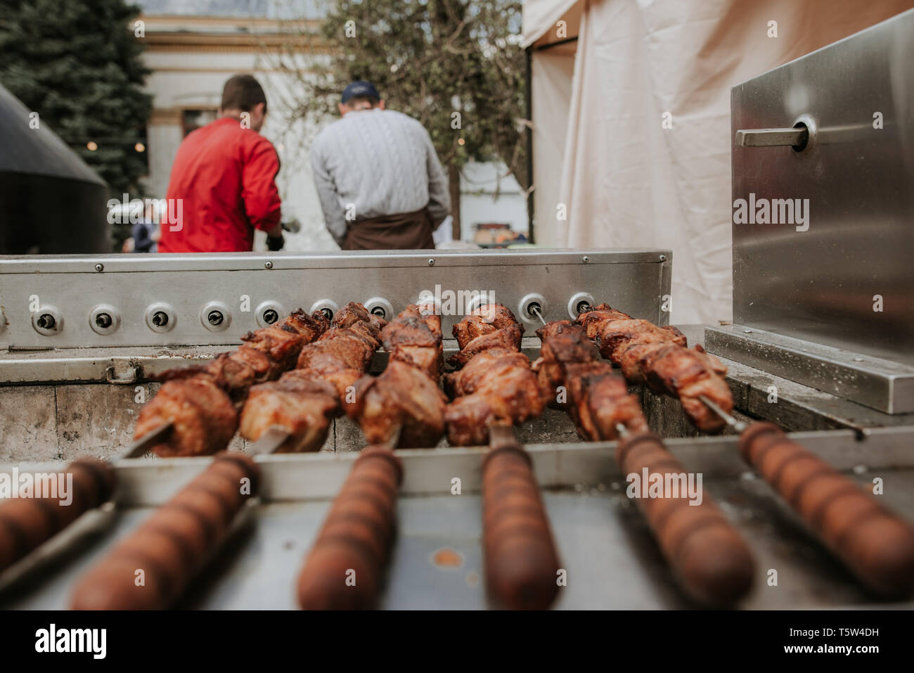 Street food. Cooking mollusks and meat on the street Stock Photo Alamy