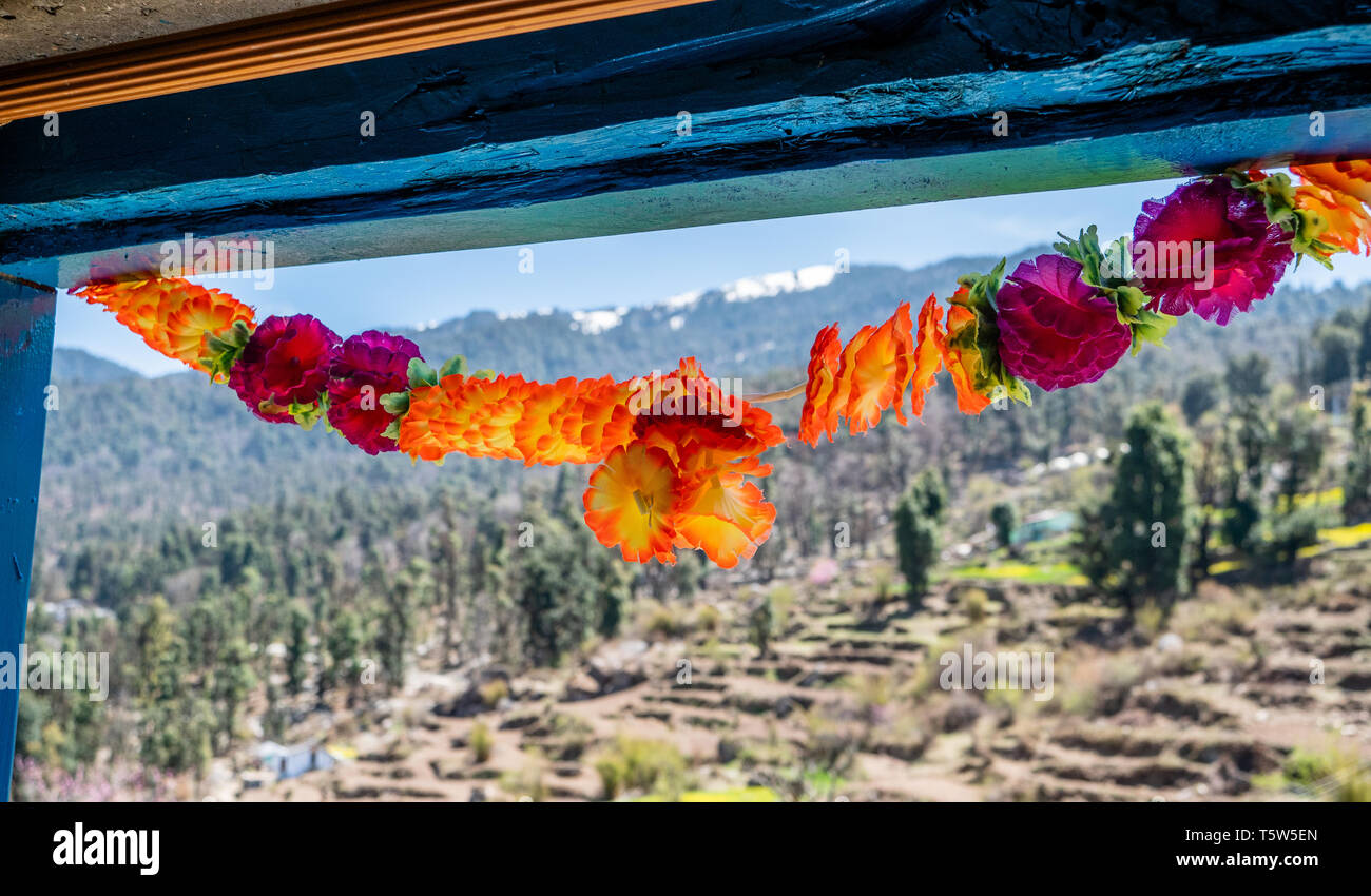 Garlands at the door of a guest house in the Himalayan village of Dhurr in the Pindar Valley of Uttarakhand Northern India Stock Photo