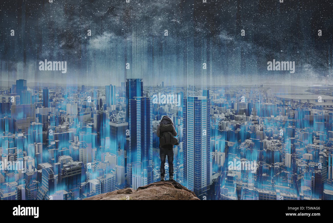 Smart city and technology, a man standing on rock with futuristic ...