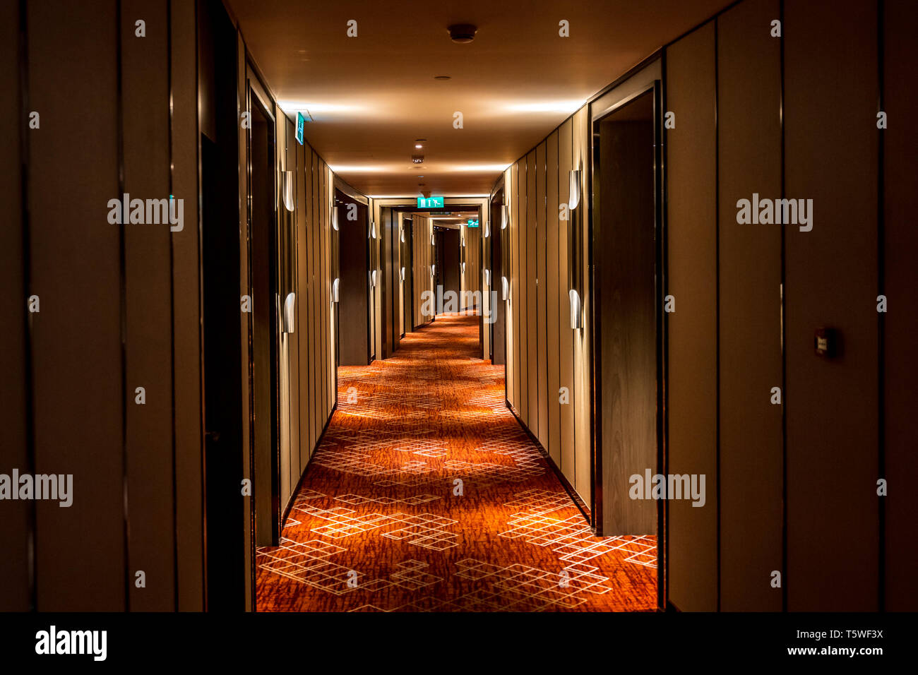 Long dark corridor in a luxury hotel Stock Photo