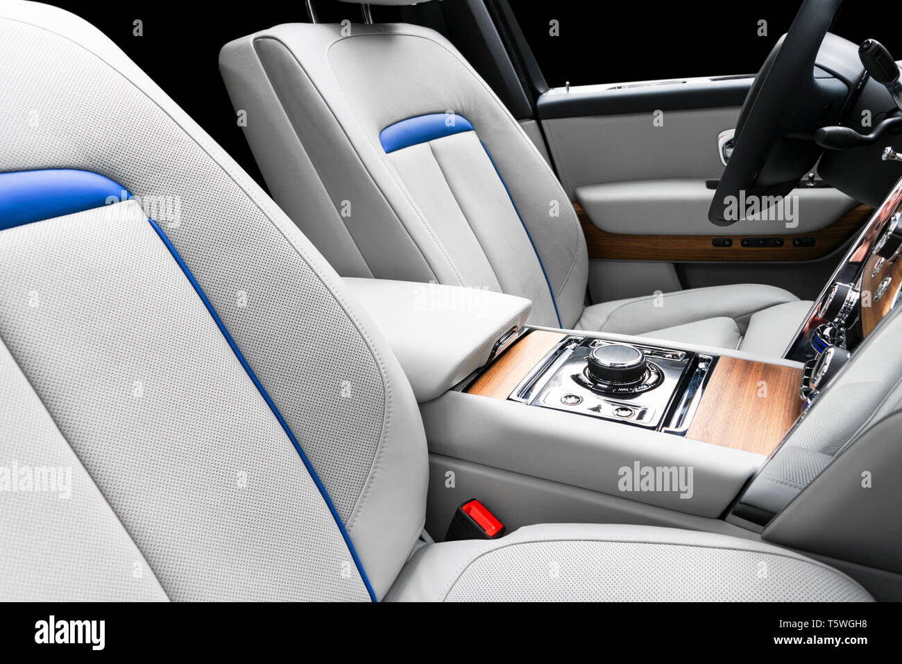 Modern luxury car white leather interior with natural wood panel. Part