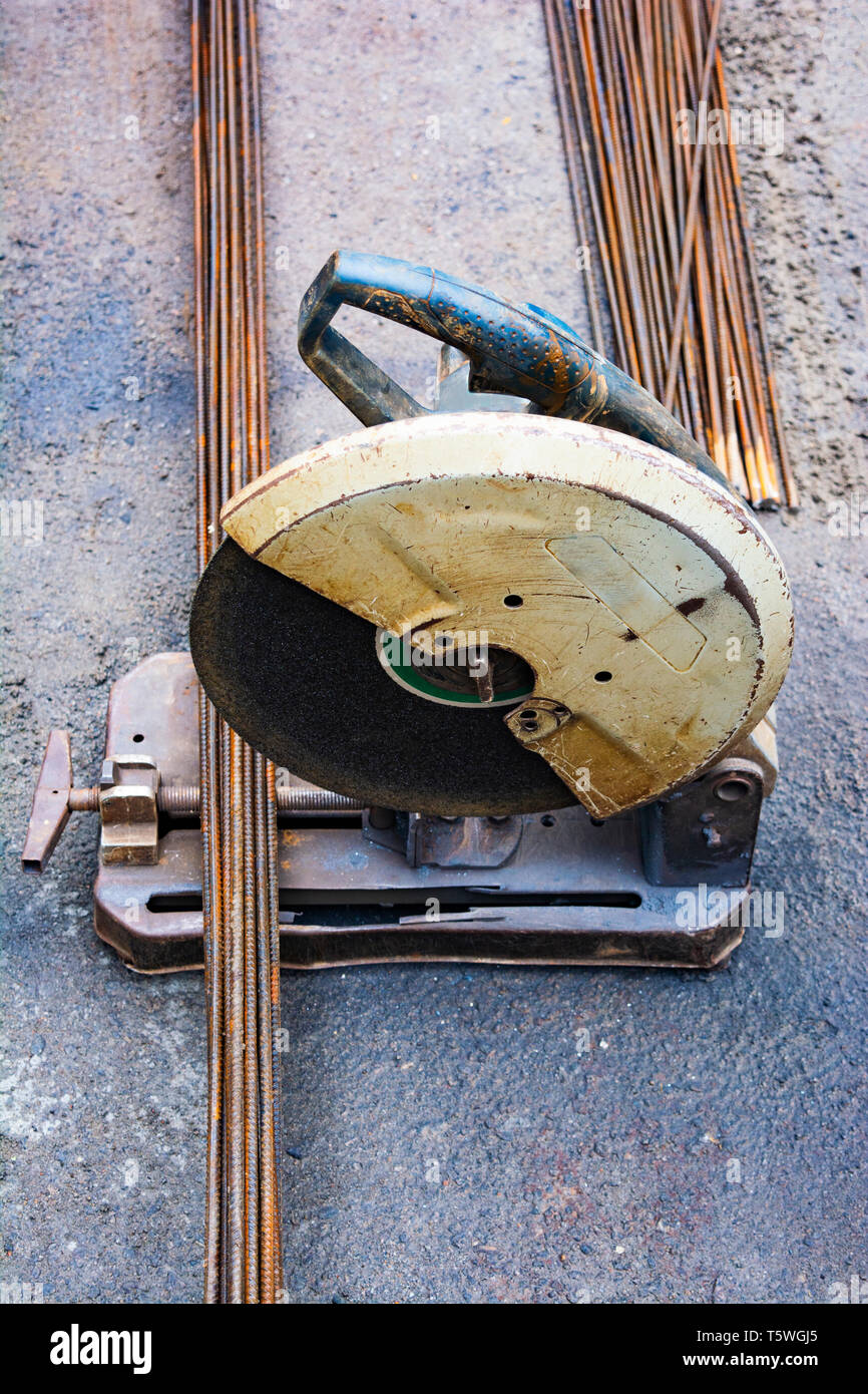 Cutting-iron rods from machine Stock Photo