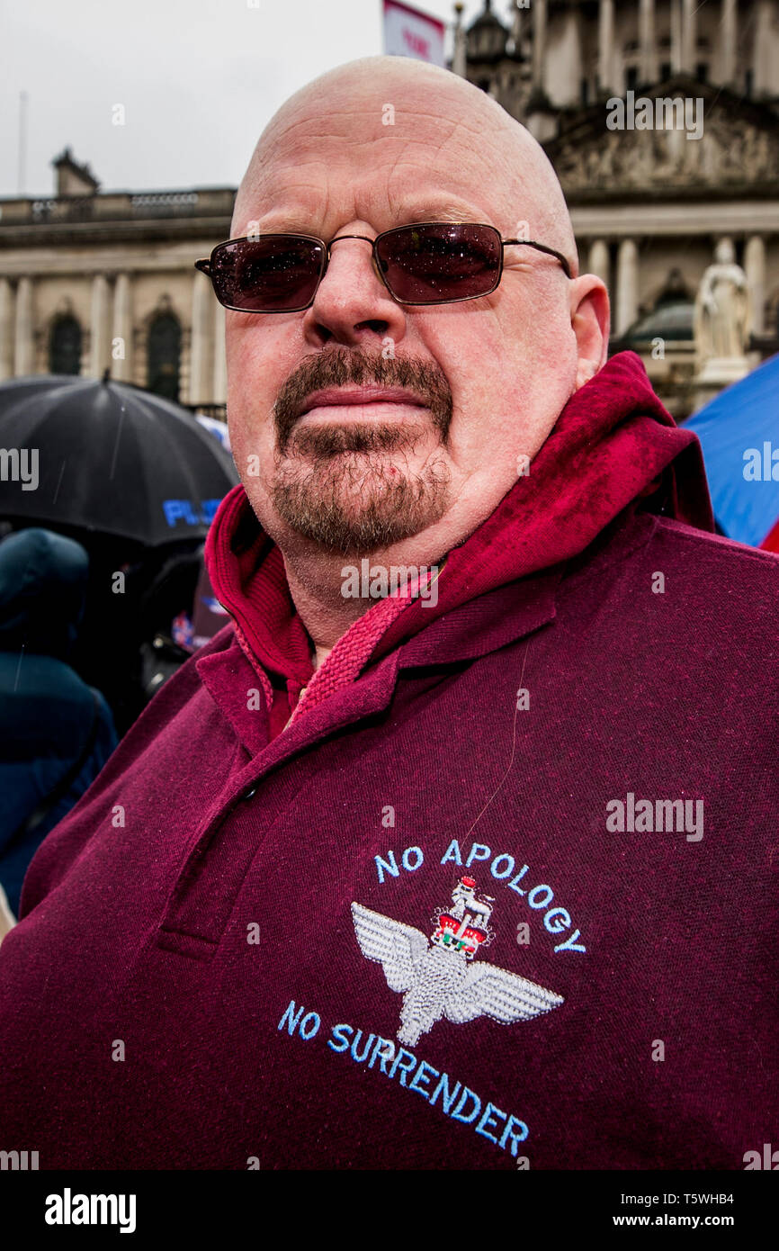 A protester outside Belfast City Hall during a rally for soldier F, a former paratrooper who is due to stand trial for murder and attempted murder for his role in the 1972 Bloody Sunday killings. Stock Photo
