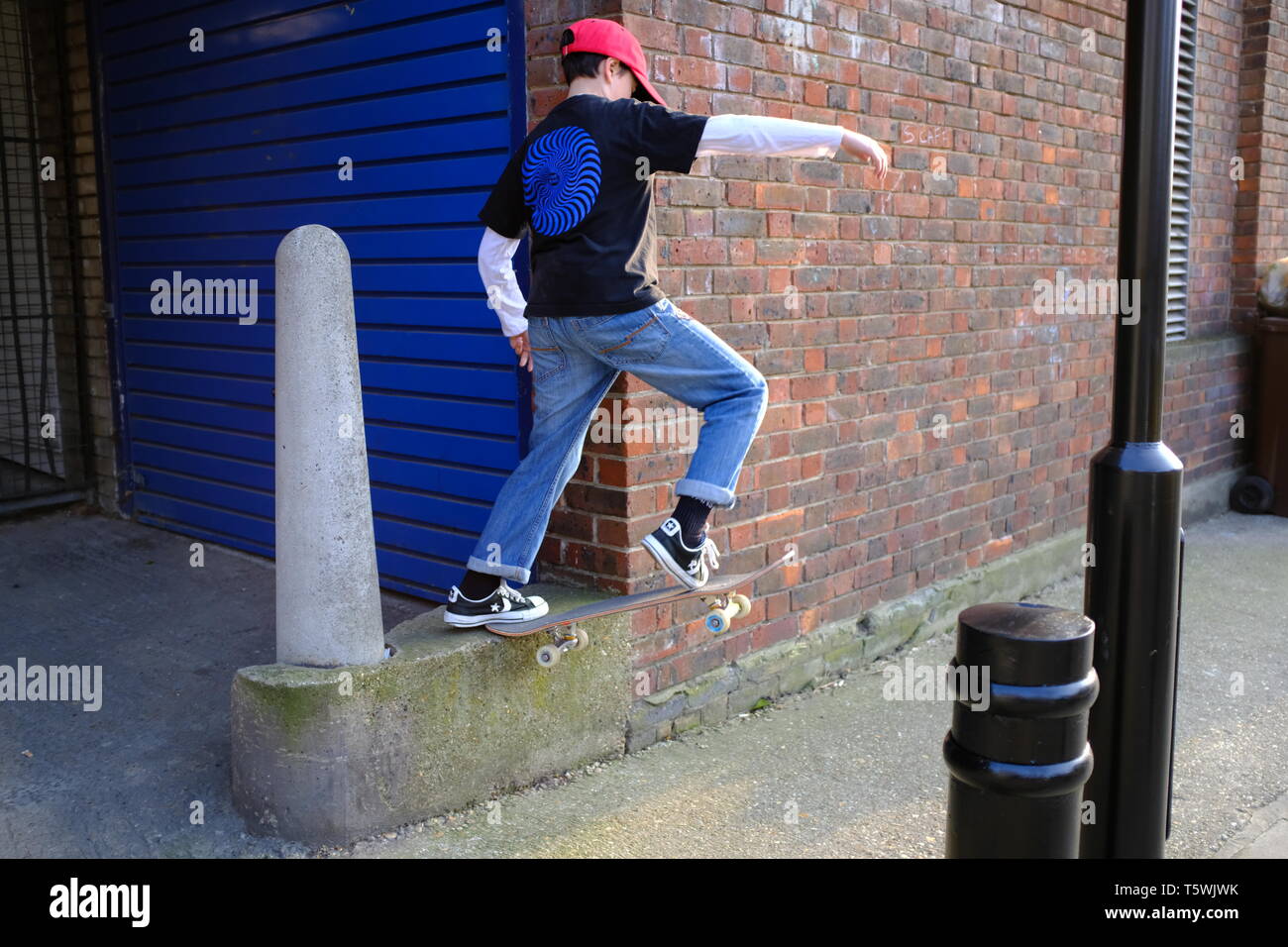 Ten year old boy skateboarding in Hackney, London Stock Photo Alamy