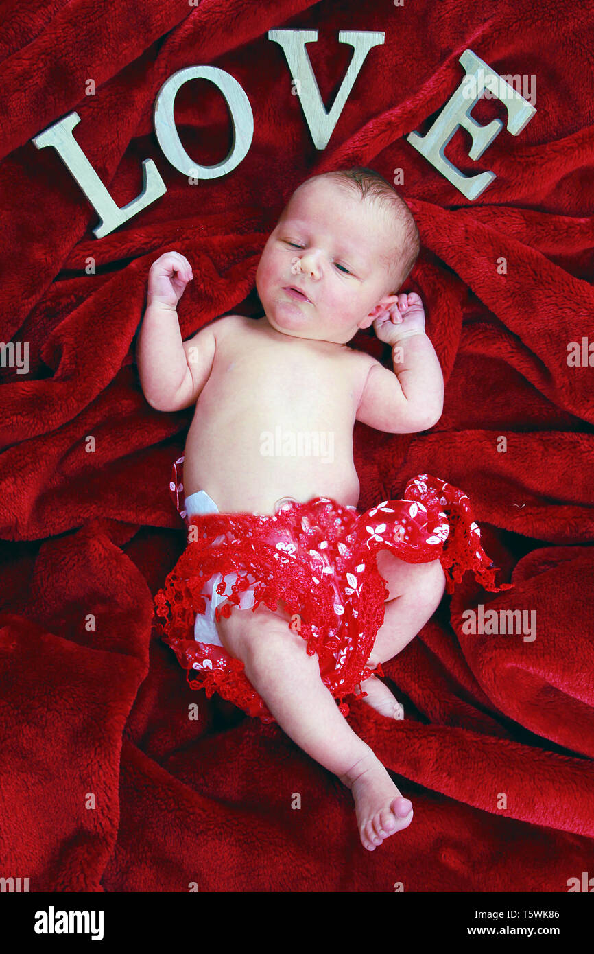 new born baby boy relaxing Stock Photo