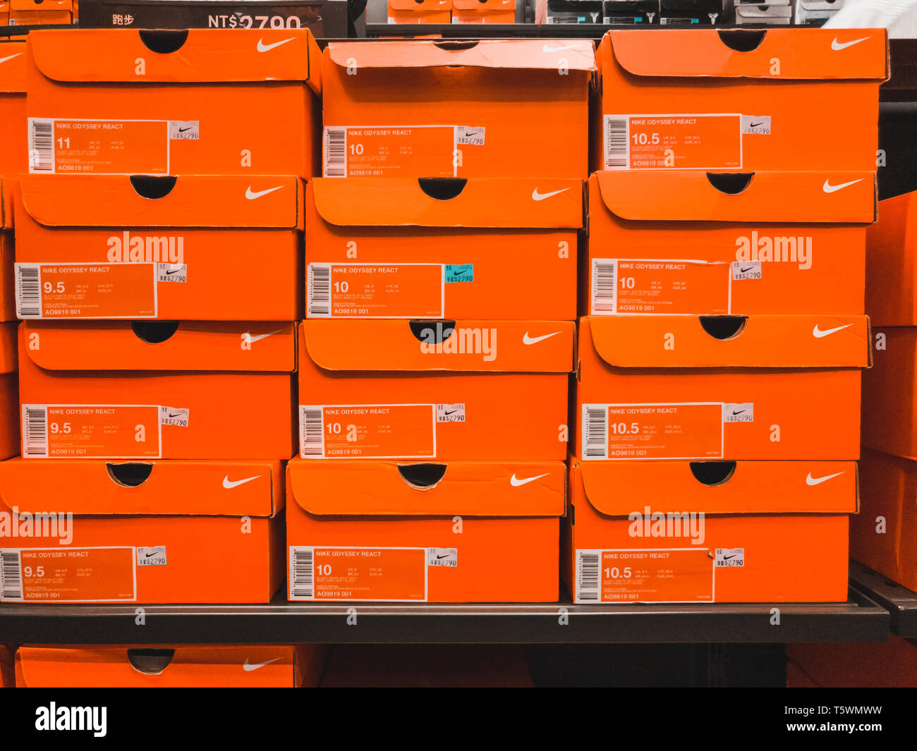 Huge stack of orange Nike Shoe boxes at Nike Factory Outlet in Taipei Stock  Photo - Alamy