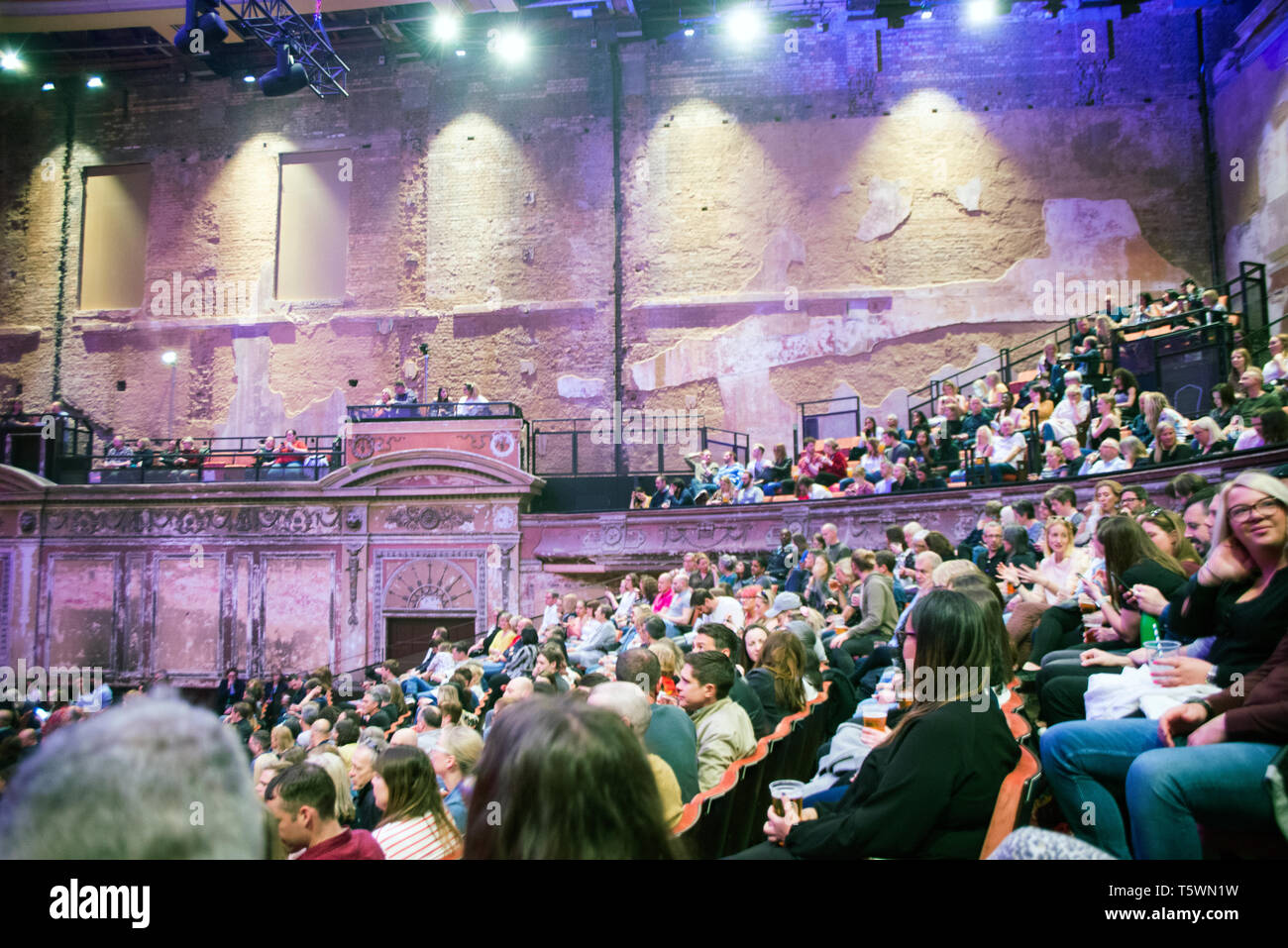 an-excited-audience-wait-for-a-show-to-start-in-the-newly-opened