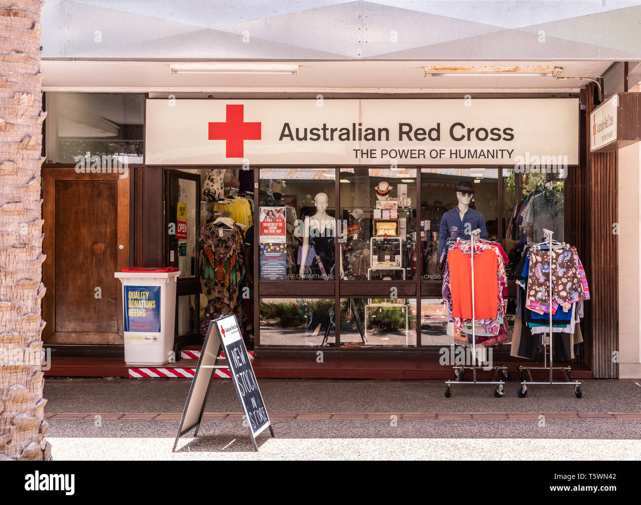 Darwin Australia - February 22, 2019: Australian Red Cross merchandise shop downtown displays clothing and other stuff in window. Stock Photo