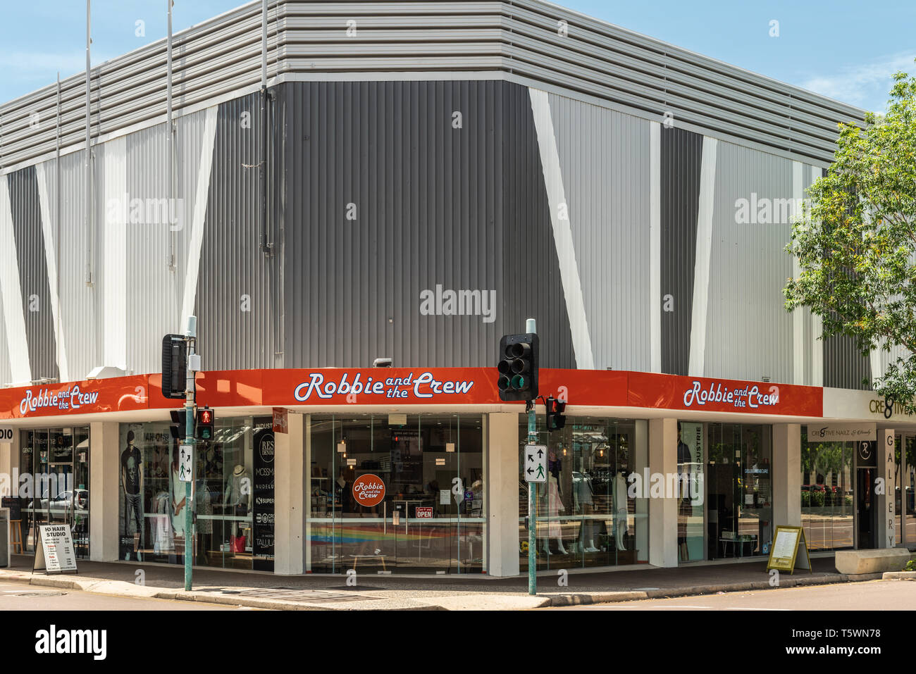 Darwin Australia - February 22, 2019: Robbie and the Crew fashion store on the mall downtown. Corner building with traffic lights in front. Large disp Stock Photo