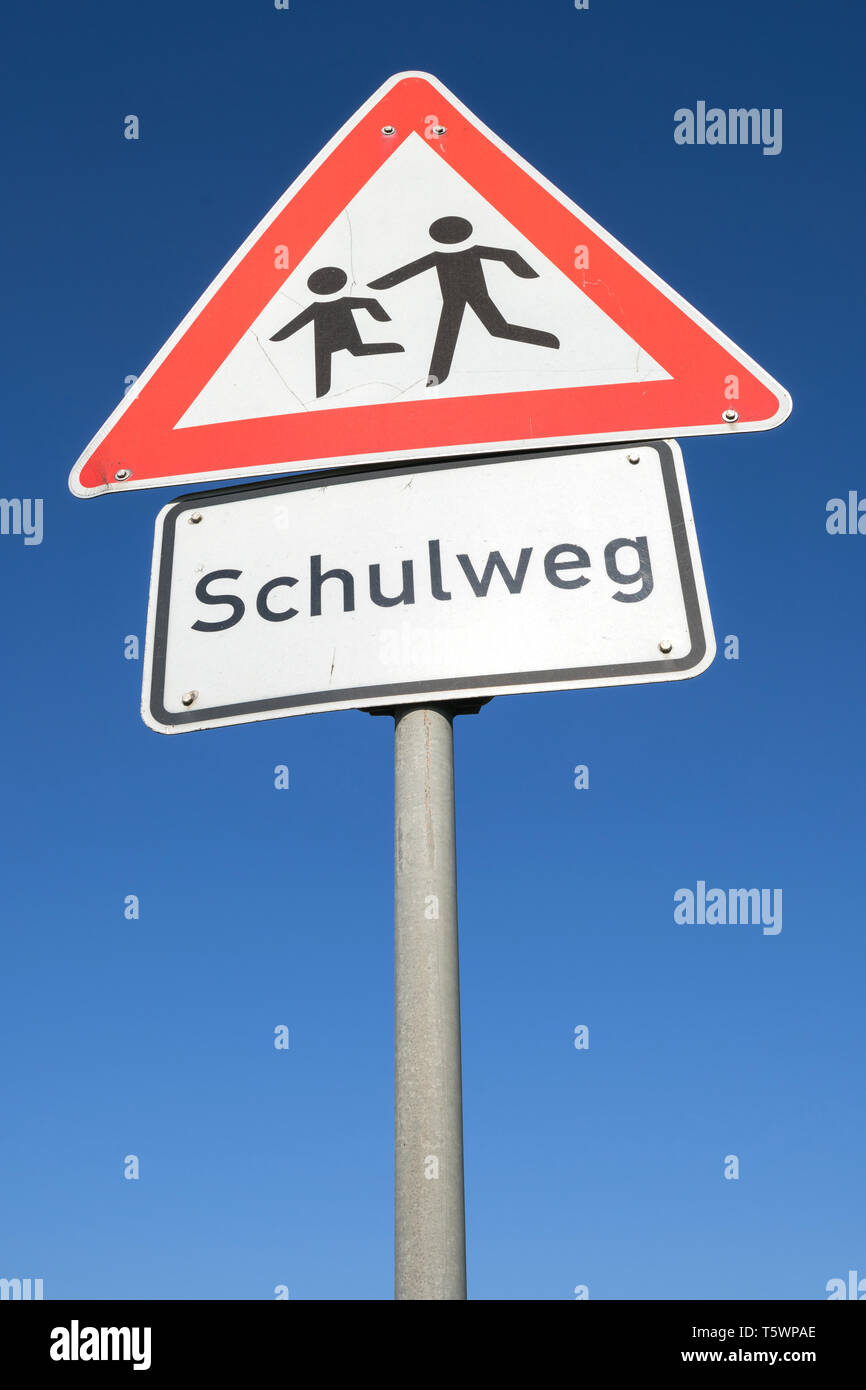 German road sign: children crossing/ way to school Stock Photo