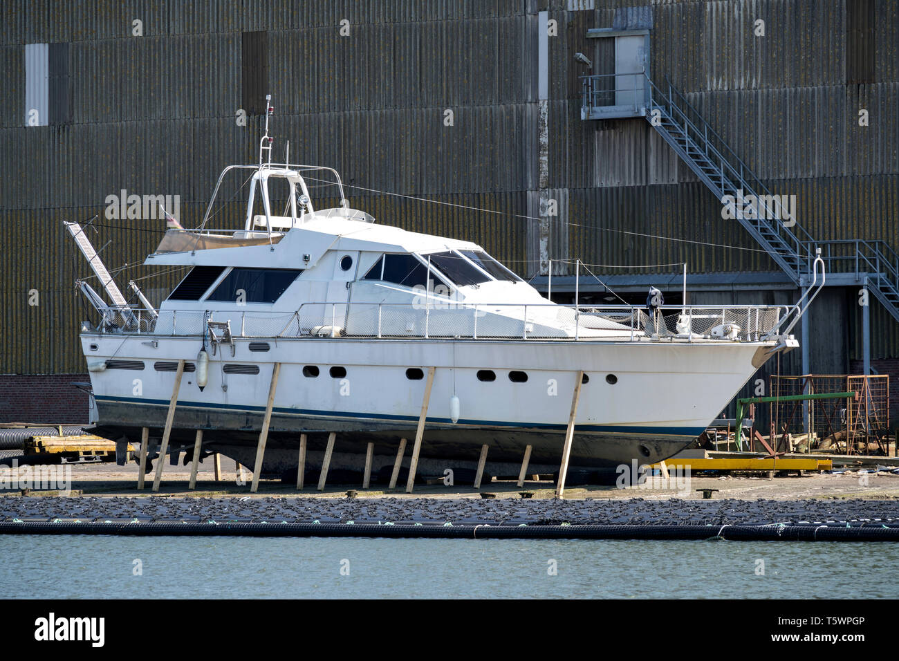 motor yacht in dockyard for maintenance Stock Photo