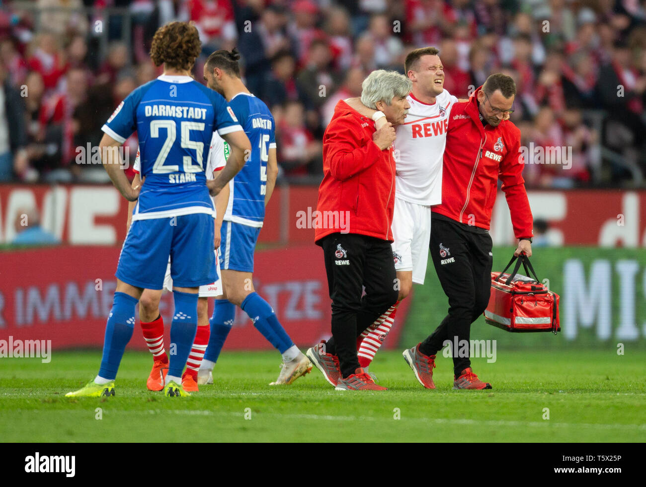 Cologne, Germany, April 26 2019, 2nd league, 1. FC Koeln vs. SV Darmstadt 98: Christian Clemens (Koeln)  verletzt.   DFL REGULATIONS PROHIBIT ANY USE  Stock Photo