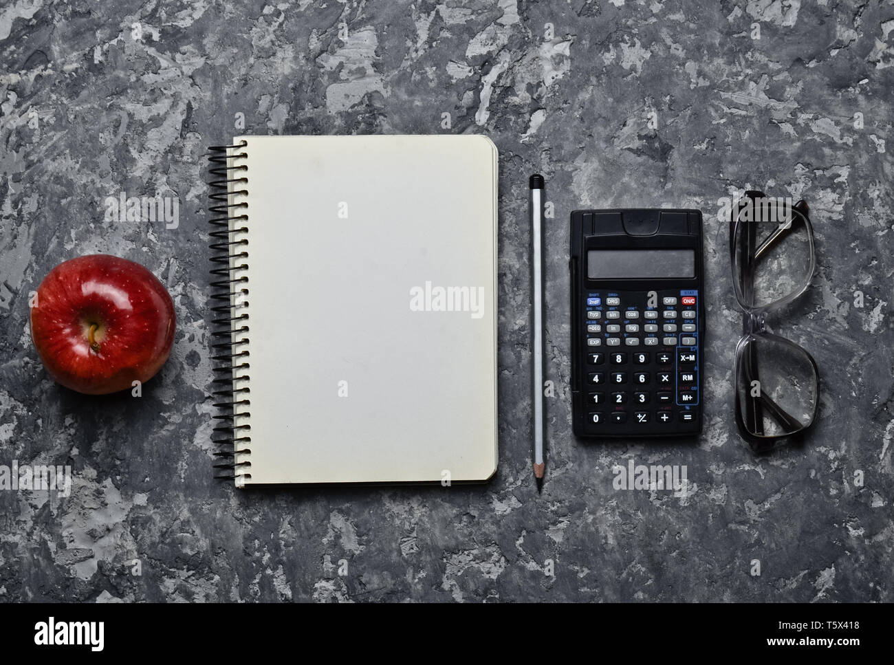 Workspace of a student engineer on a concrete surface. Loft style ...