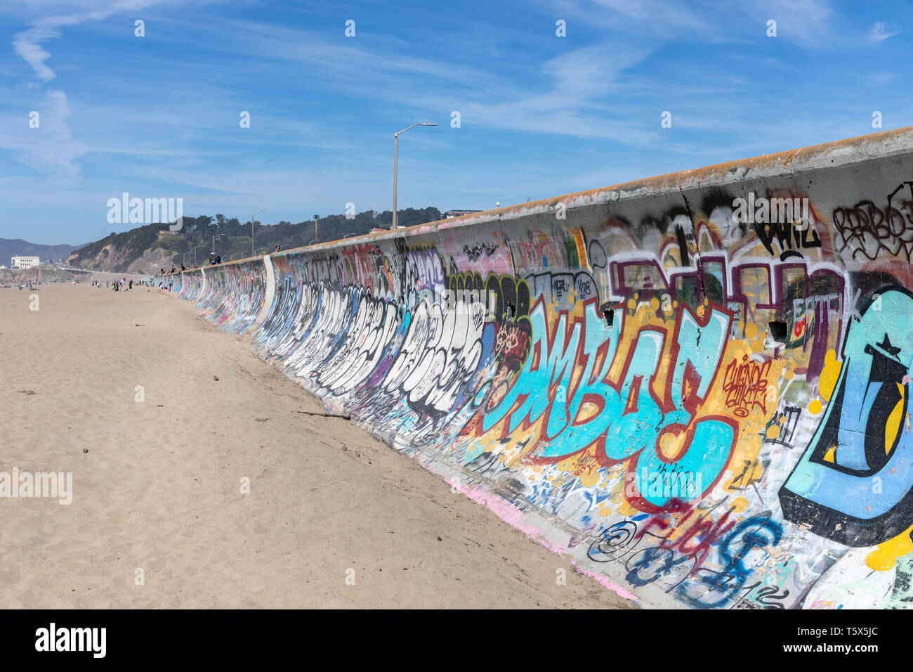 Graffiti on concrete wall along Ocean Beach, San Francisco, California Stock Photo