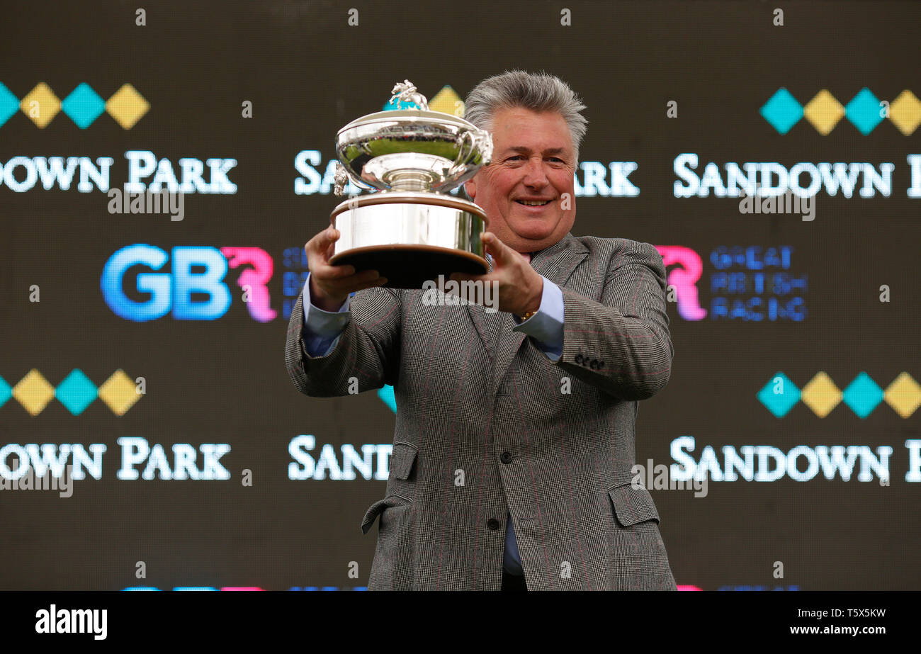 Paul Nicholls with the Champion National Hunt Trainer Trophy at Sandown