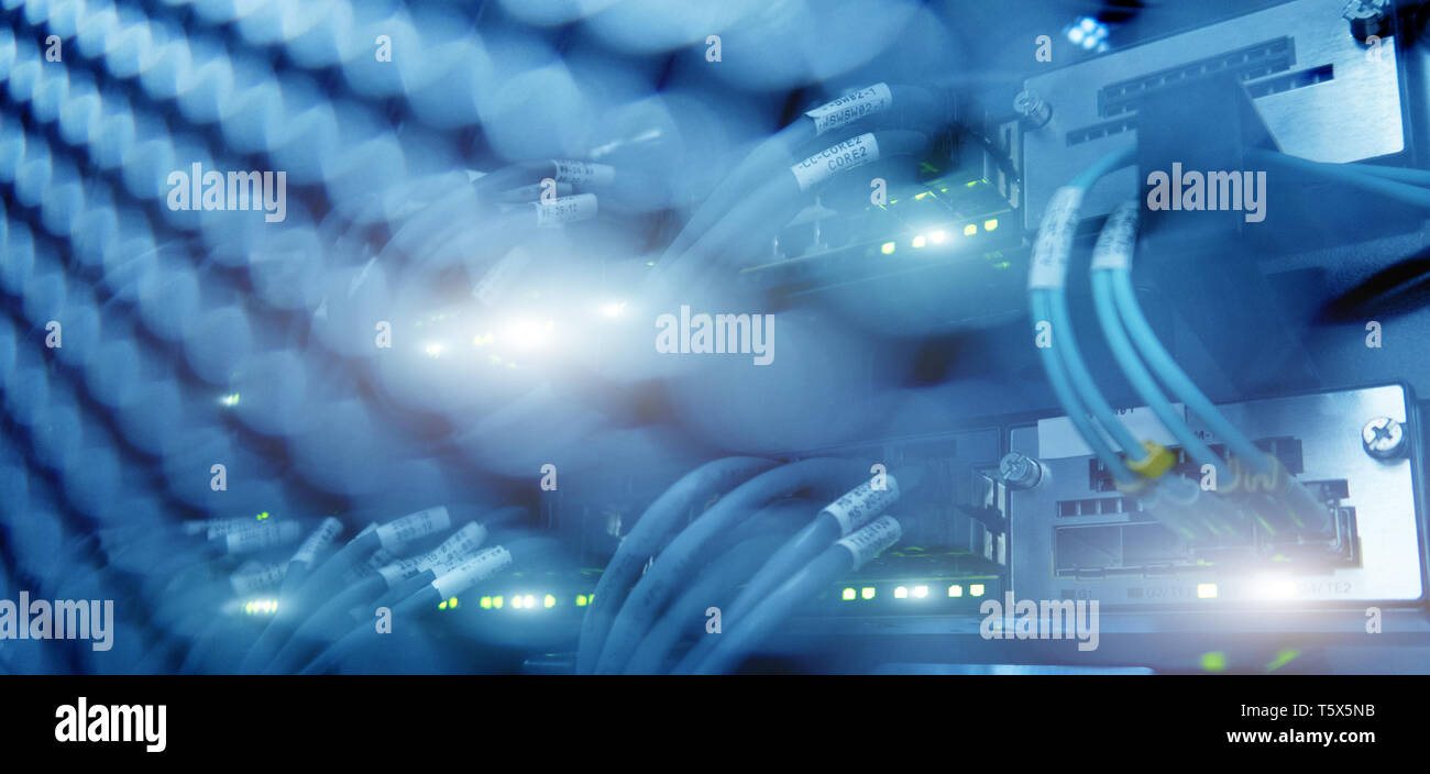 Close up fiber optic and hub in server room Stock Photo - Alamy