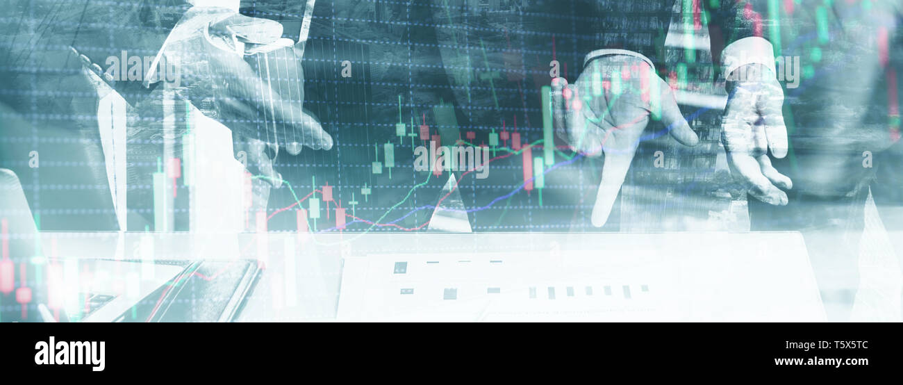 Double exposure of professional trader. Stock candles graph of stocks market. Stock Photo