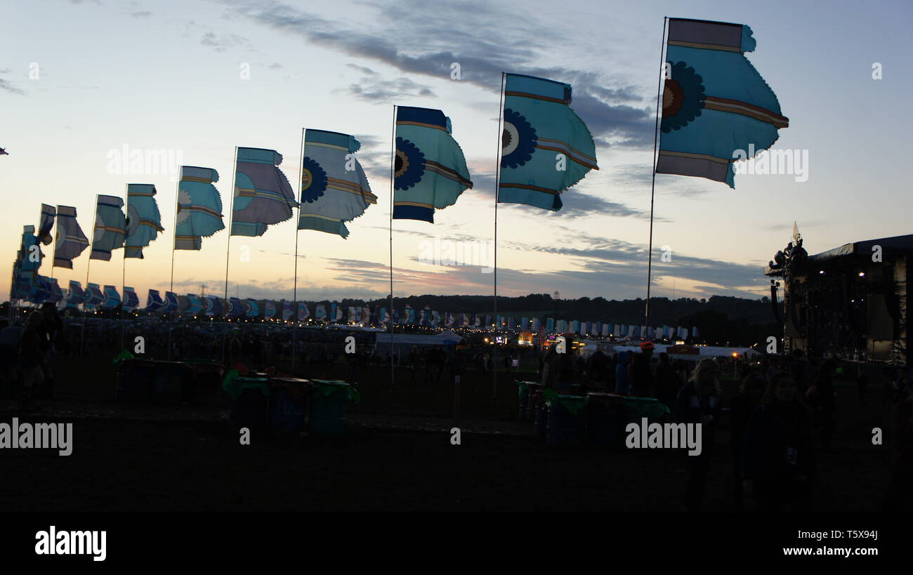 Flags at sunset Glastonbury Music Festival Stock Photo